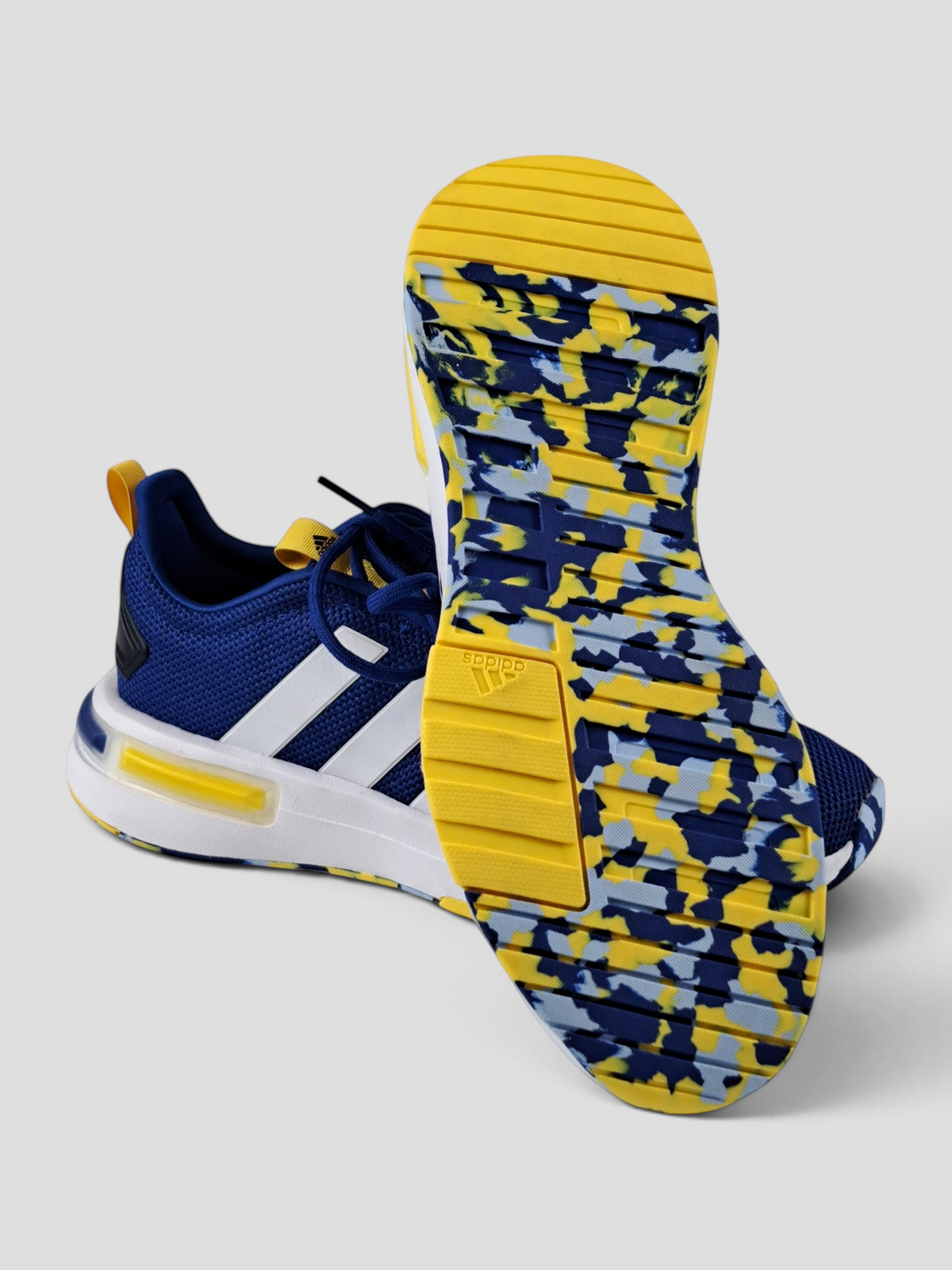 BaraBarnet blue and yellow Adidas children's running sneakers with a patterned sole and white side stripes