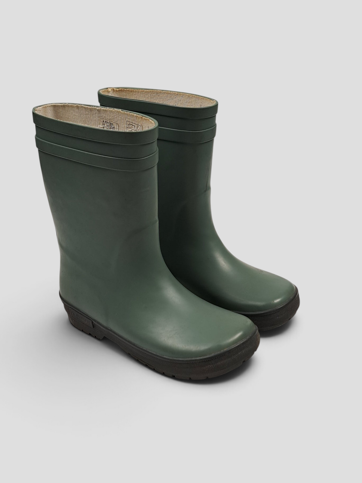 BaraBarnet Everest green rubber boots with black soles and beige lining, featuring a durable design.