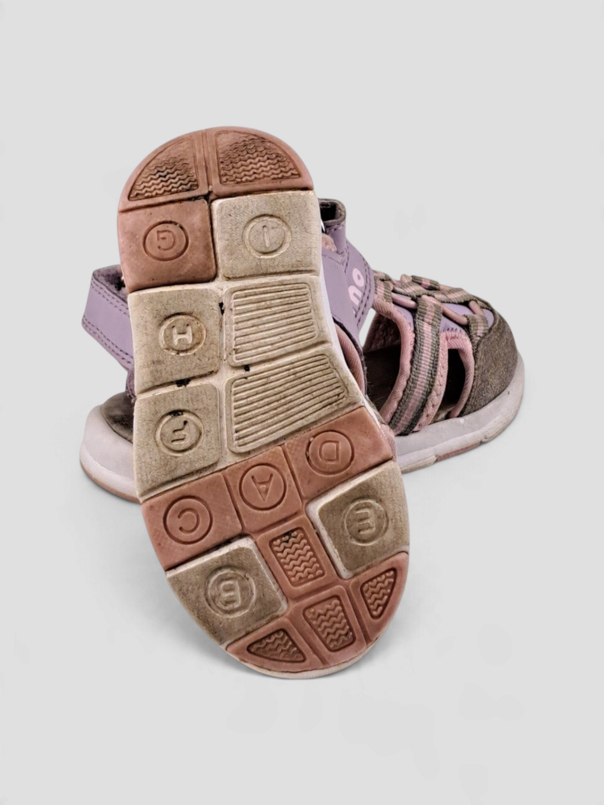 BaraBarnet Mino purple and pink children's sandals with velcro strap and textured sole, viewed from below