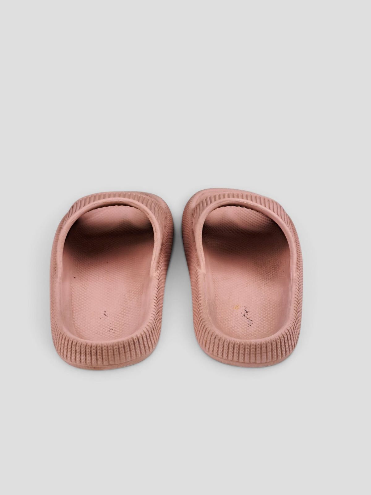 BaraBarnet pink Happy Flops slip-in sandals with a ribbed upper and contoured footbed, shown from above.