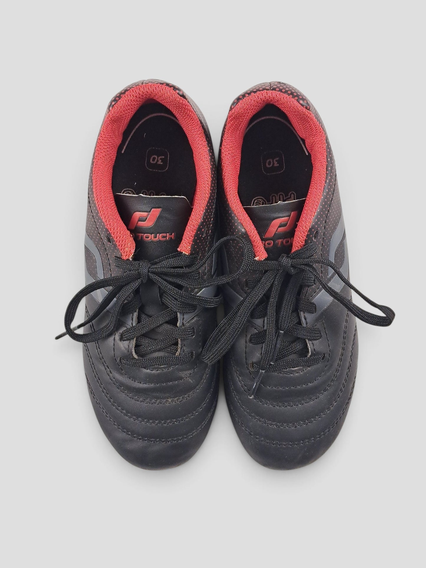 BaraBarnet ProTouch size 30 black football boots with red interior lining and black laces
