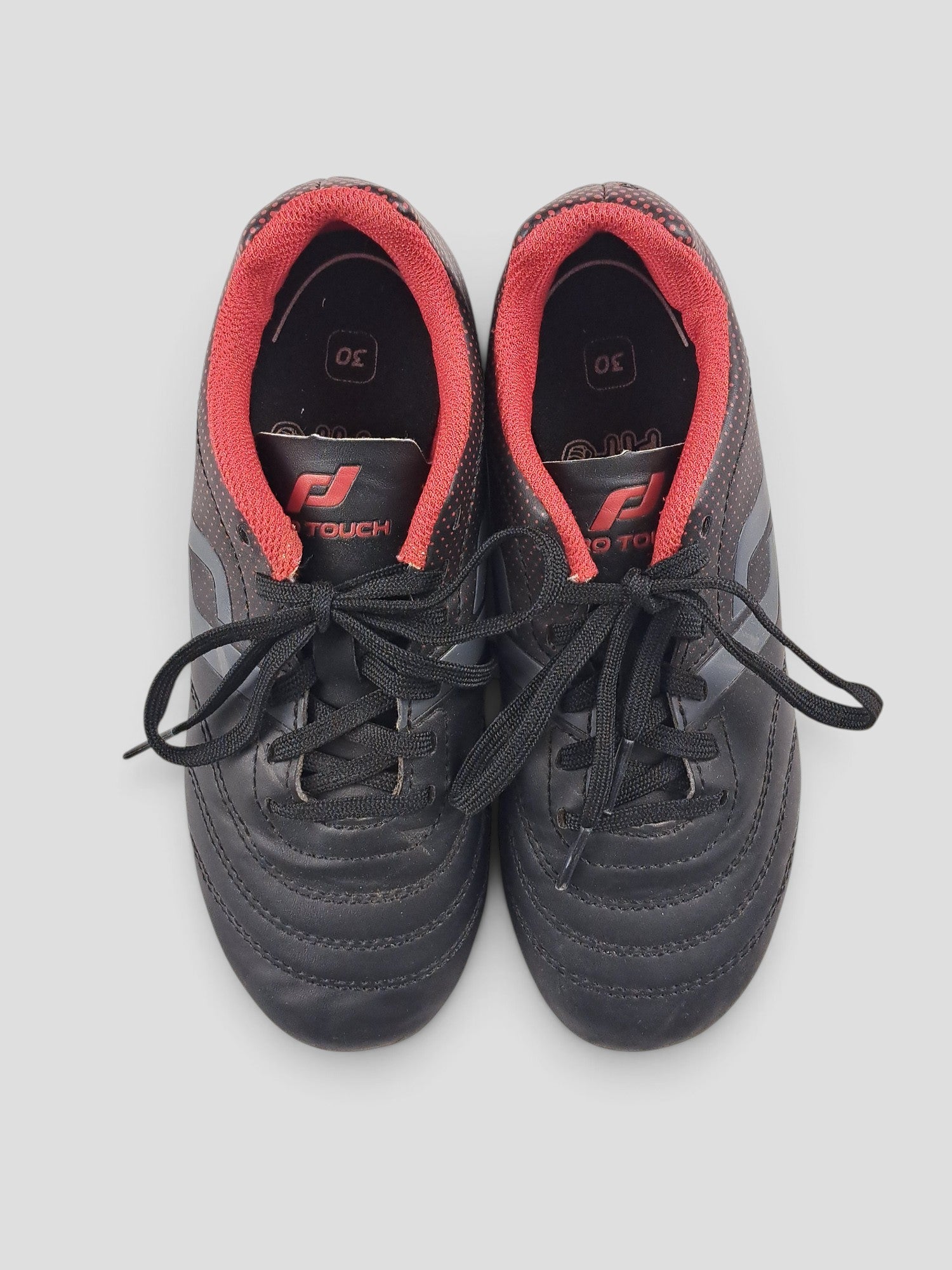 BaraBarnet ProTouch size 30 black football boots with red interior lining and black laces