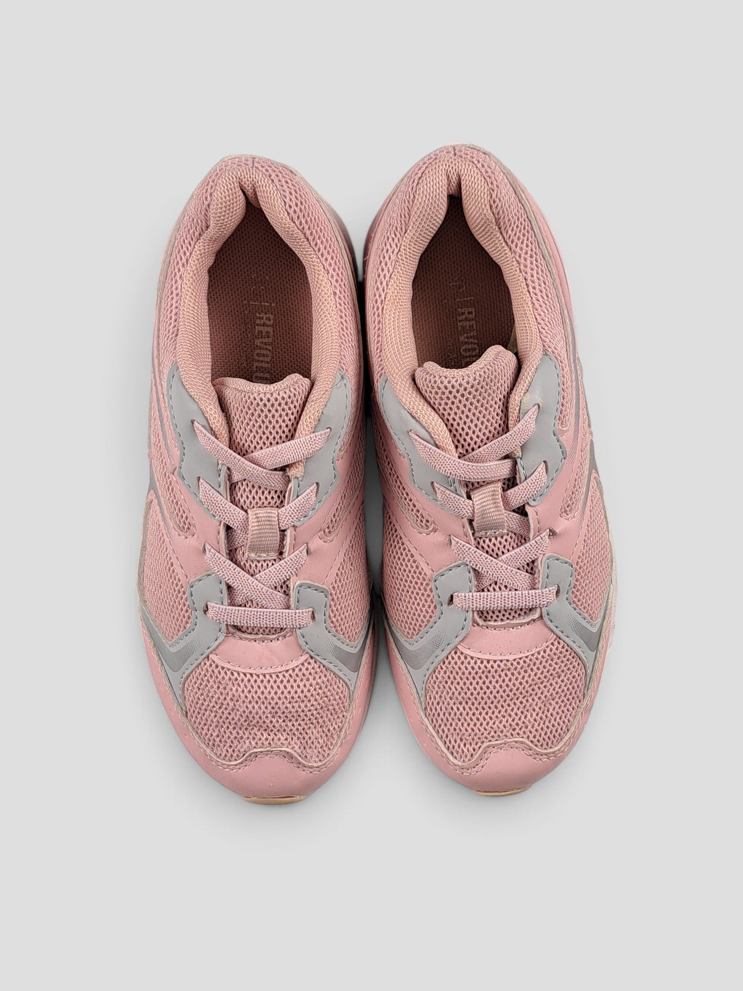 BaraBarnet REVOLUTION pink mesh sneakers with grey accents and lace-up closure viewed from above