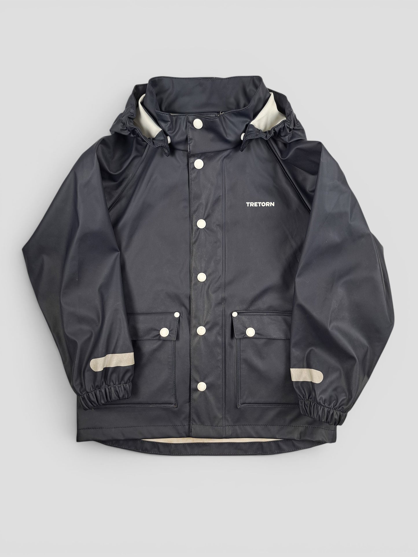 BaraBarnet Tretorn Kate navy blue waterproof rain jacket for children with hood and snap button closure